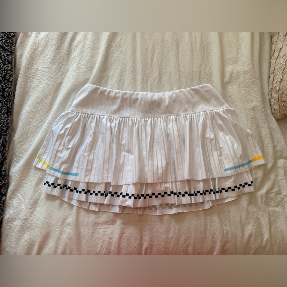 Lucky in Love White Mini Skirt with Black, Blue, and Yellow Accents